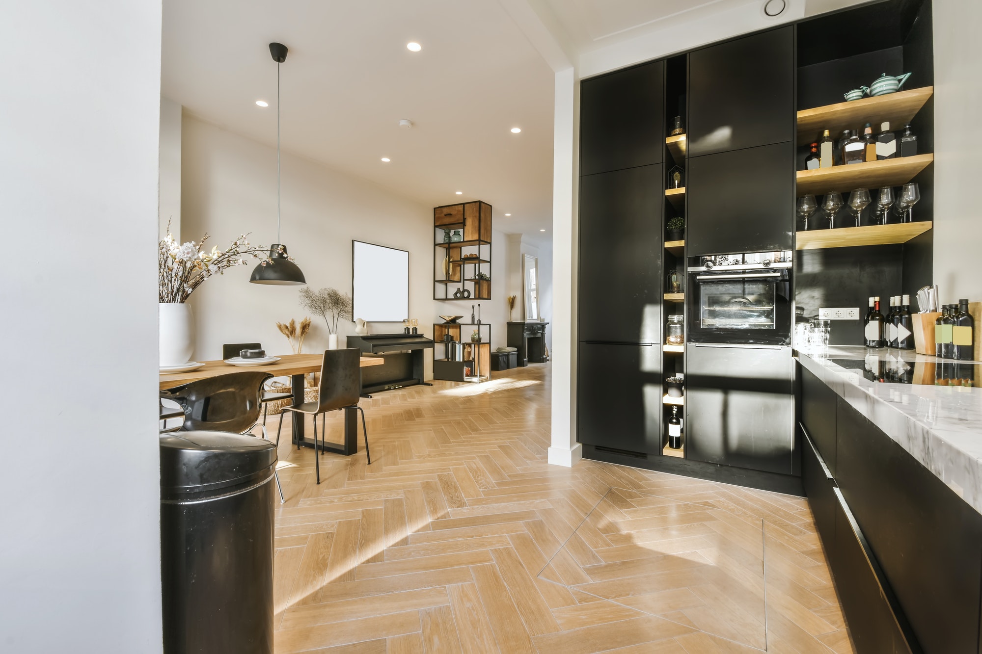 Delightful kitchen with black kitchen unit