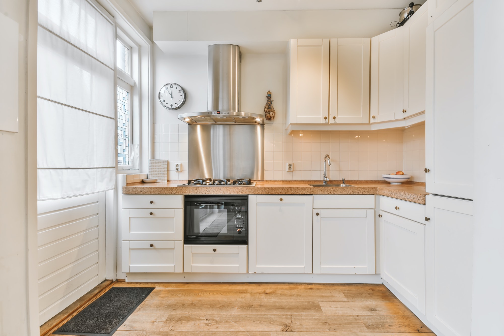 Lovely and cozy kitchen with beige marble countertop