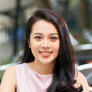 young-businesswoman-smiling-portrait-SA5WDAQ.jpg