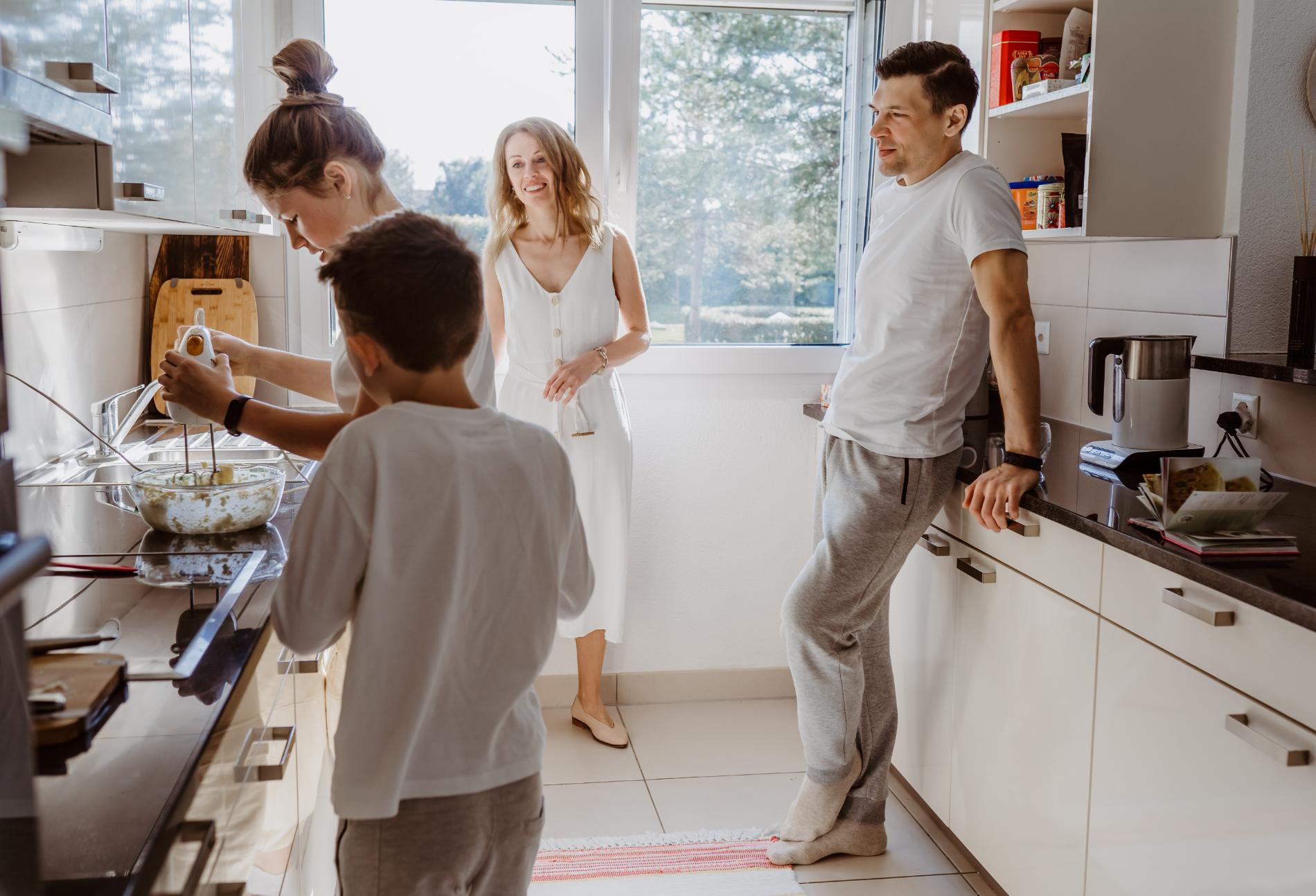 happy-family-cooking-at-home-kitchen-together-wee-2023-11-27-05-08-52-utc.jpg